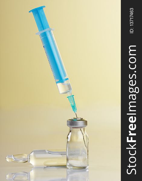 Medicine Vials And Syringe