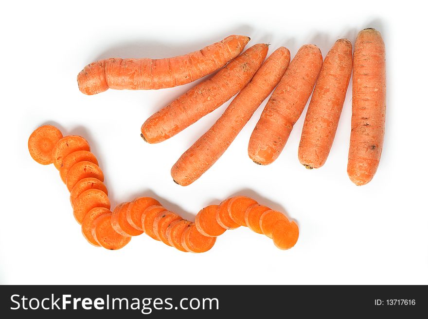 Few carrots and sliced carrot isolated on white background with clipping path. Few carrots and sliced carrot isolated on white background with clipping path