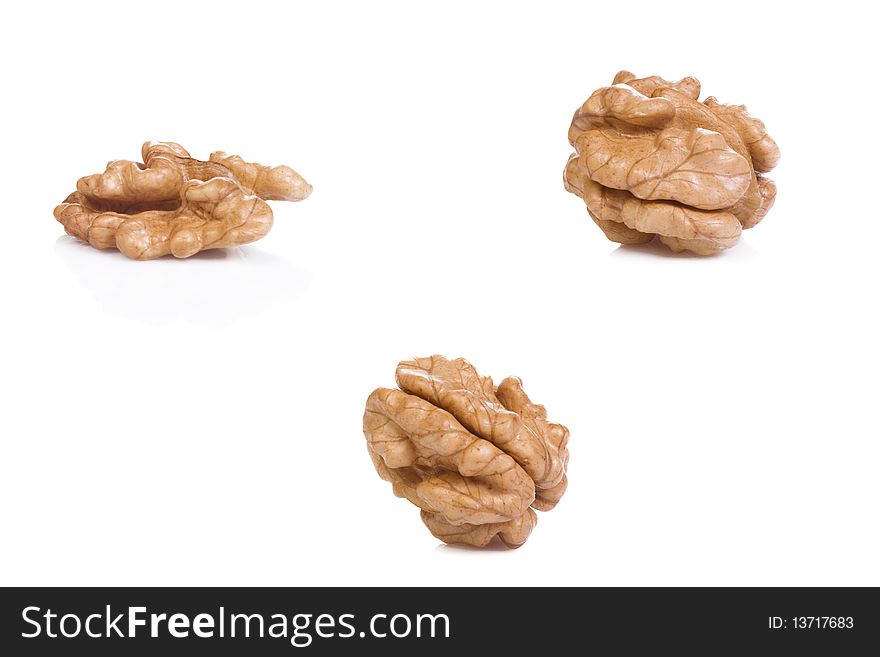 Tasty walnuts at white background