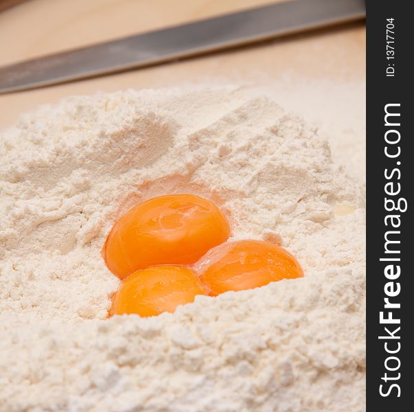 Fresh eggs and flour laying in the kitchen