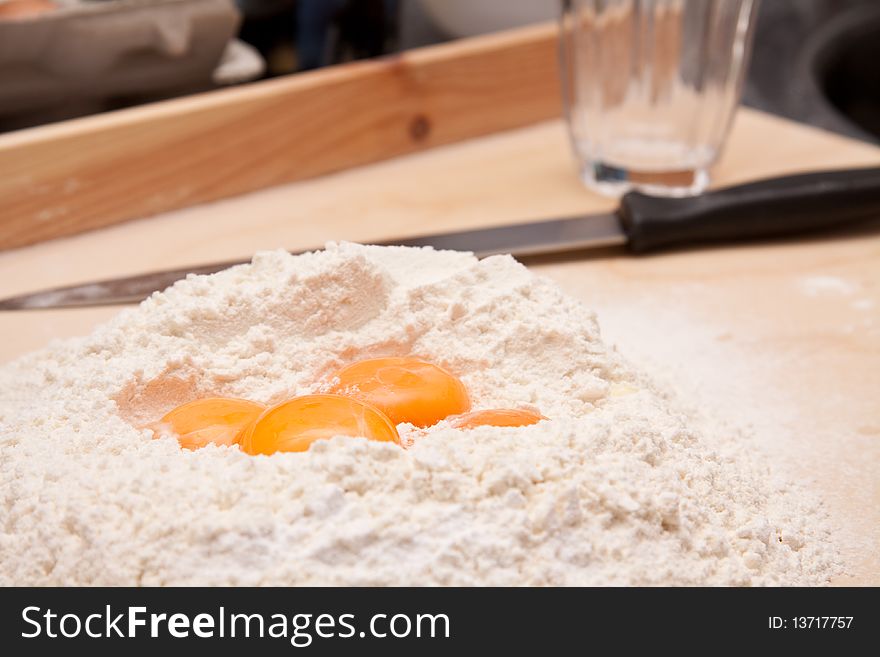 Fresh eggs and flour laying in the kitchen
