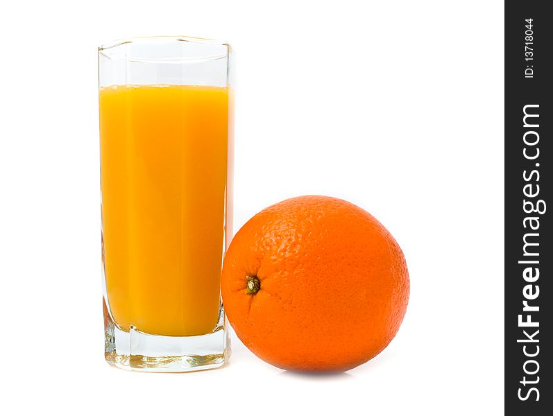 Glass with orange juice and orange on a white background