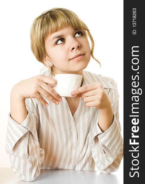 Beautiful young girl with a cup on a white background