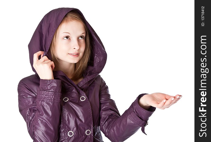 Girl in raincoat in the rain. Isolated on white