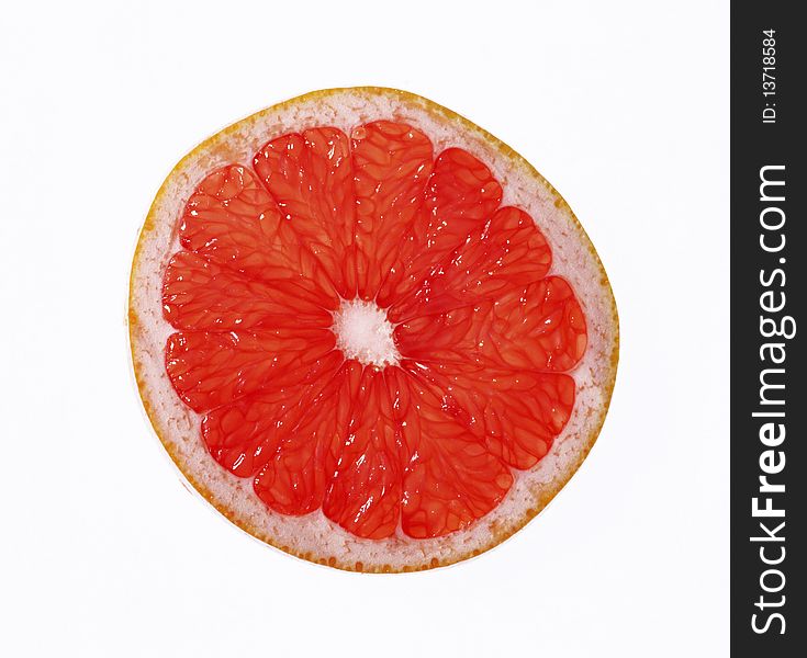 Half of the fresh ripe grapefruit on white background. Half of the fresh ripe grapefruit on white background