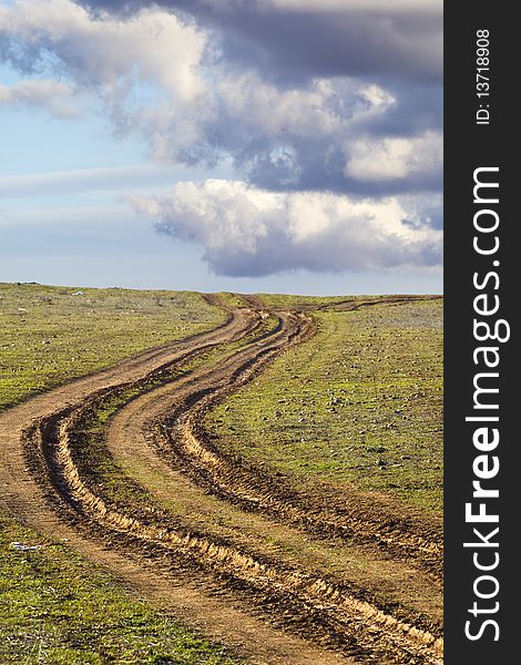 Country road with mud, ruts