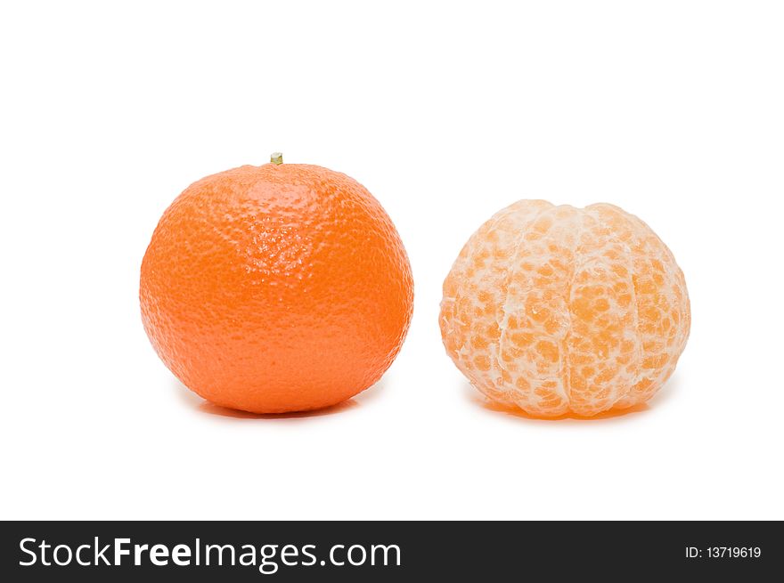 Fresh tangerines isolated over white