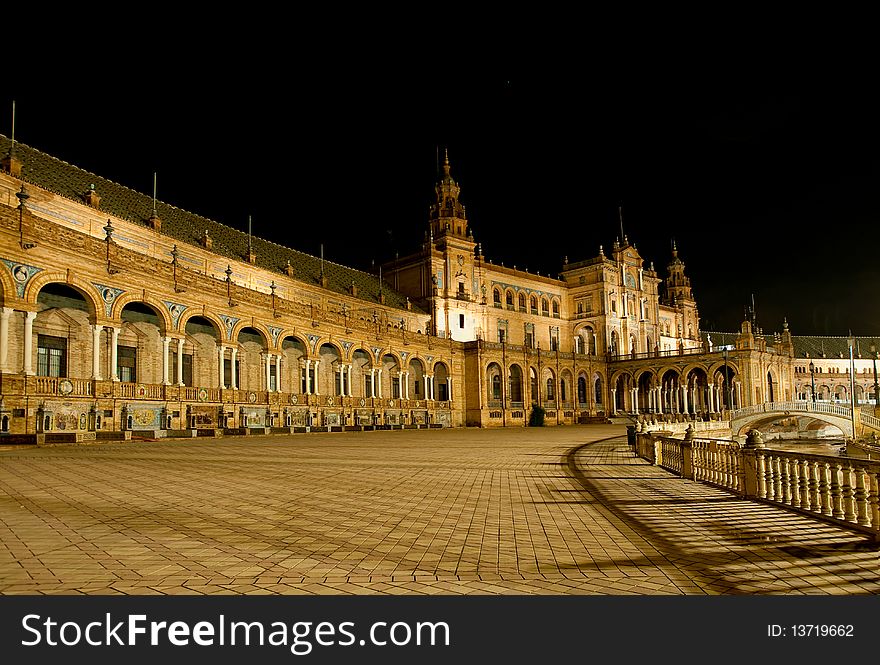 The Plaza de EspaÃ±a is a building in Seville, Spain, an example of Moorish Revival in Spanish architecture. In 1929 Seville hosted the Spanish-American Exhibition