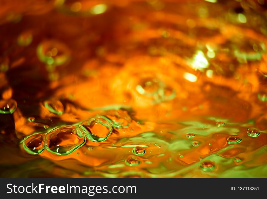 Multicolored yellow with green background with bubbles, soft focus