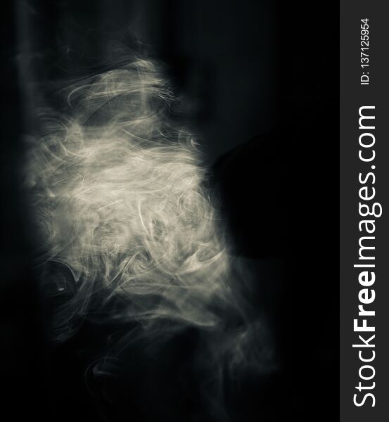 White Cigarette Smoke With Black Background Photo