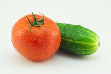 Fresh Cucumber And Tomato On A White Background Stock Photo