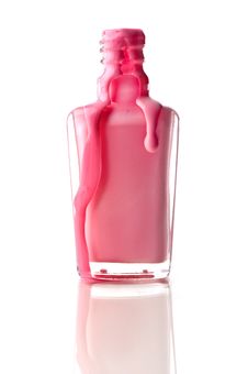 Pink Nail Polish Running Out Of A Container Royalty Free Stock Photos
