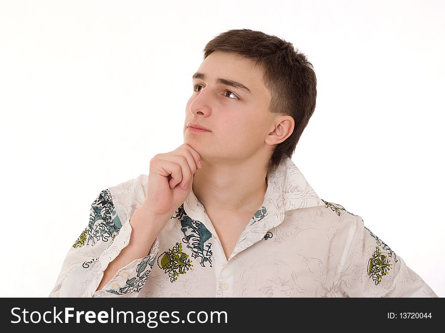 Young man standing on a white background