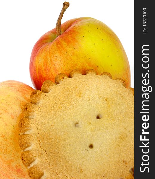 Small Applepie. Close up on white background. Fresh apple behind the pei