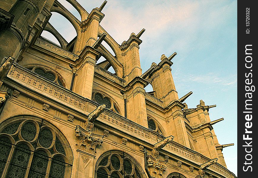 Facade of Notre Dame Church in bright blue sky at Paris, France. Facade of Notre Dame Church in bright blue sky at Paris, France