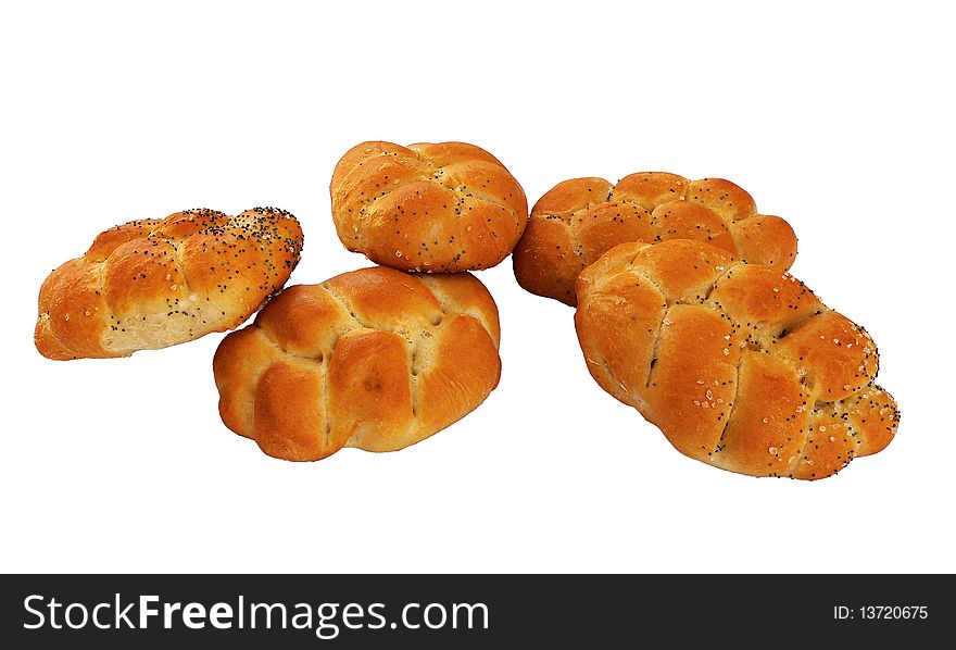 Several beautifully baked buns sprinkled with salt and poppy seeds on a white background. Several beautifully baked buns sprinkled with salt and poppy seeds on a white background