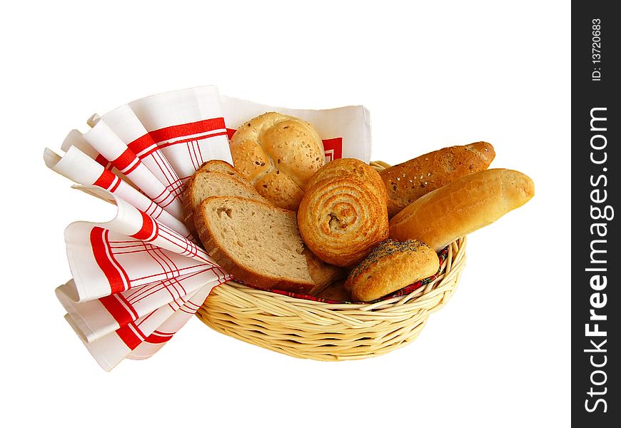 Rolls, buns and bread in a basket with a cloth. Rolls, buns and bread in a basket with a cloth