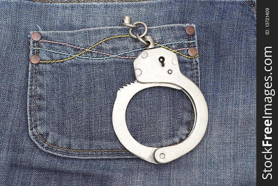 Handcuffs In Jeans Pocket