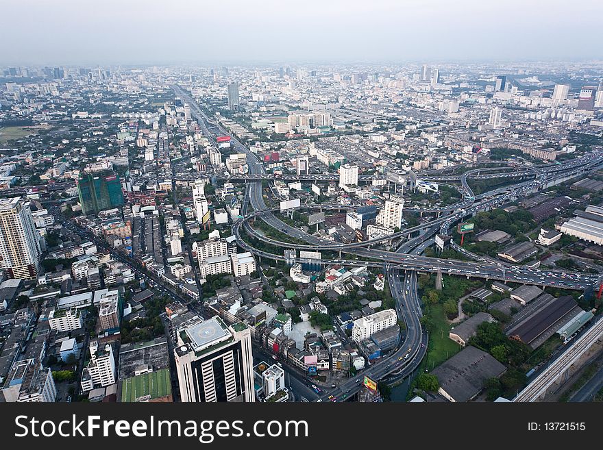 View from the Bayoke Sky Hotel on Bangkok. Buildings in Bangkok highlighting the pollution problem showing the smog on a relatively clear day.