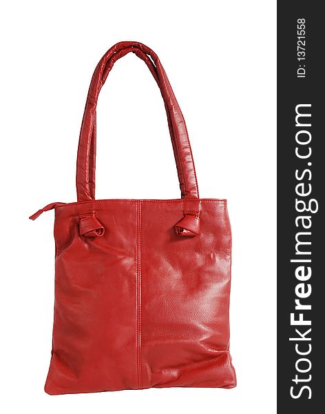 This is a beautiful red leather ladies handbag isolated on a white background.