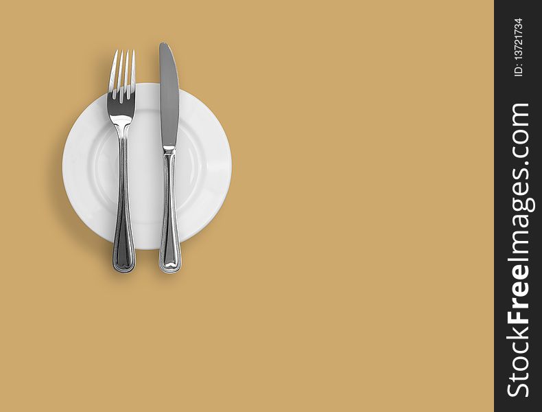 Knife, plate and fork on beige background. Knife, plate and fork on beige background