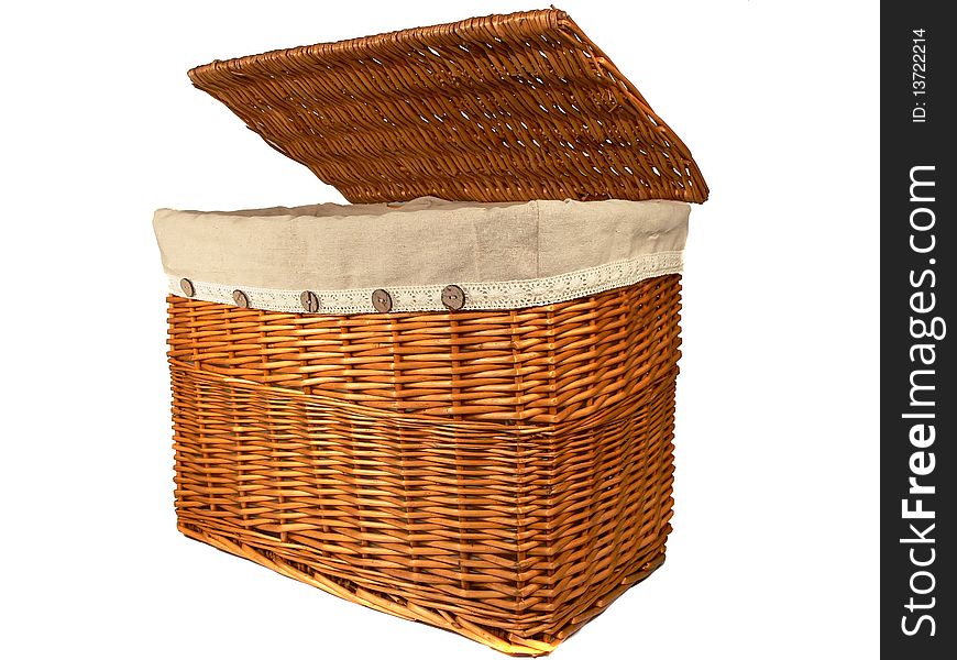 A wicker laundry basket isolated on white