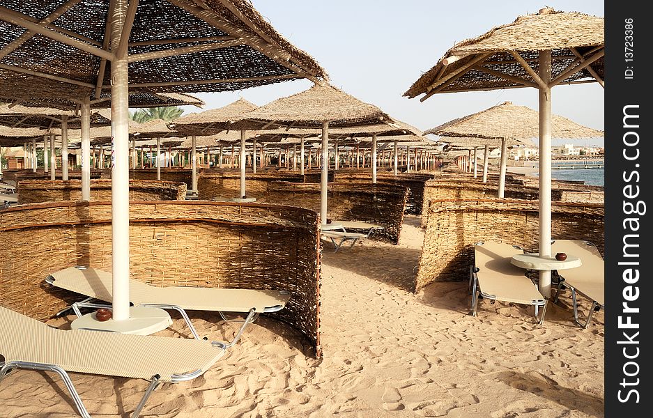 Sunbeds and umbrellas on the beach