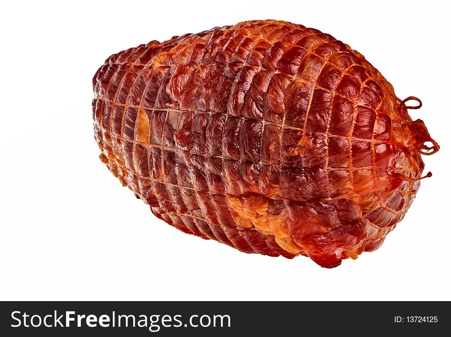 Big tasty smoked ham isolated over white background. Big tasty smoked ham isolated over white background.