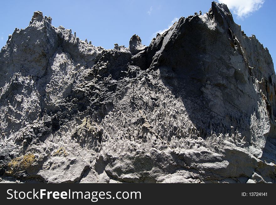 Rocky mountains, precipices and canyons against the sky. Rocky mountains, precipices and canyons against the sky