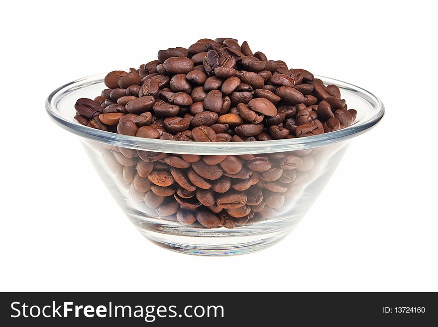Coffee beans in transparent bowl isolated over white background. Coffee beans in transparent bowl isolated over white background.