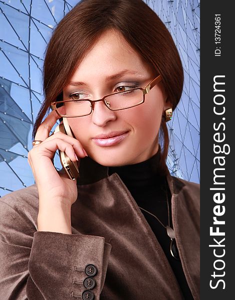 Elegant young bussiness woman calling phone. Elegant young bussiness woman calling phone