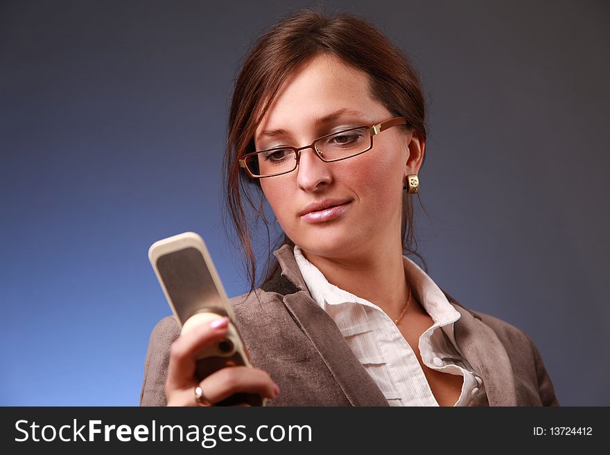 Elegant young bussiness woman calling phone. Elegant young bussiness woman calling phone