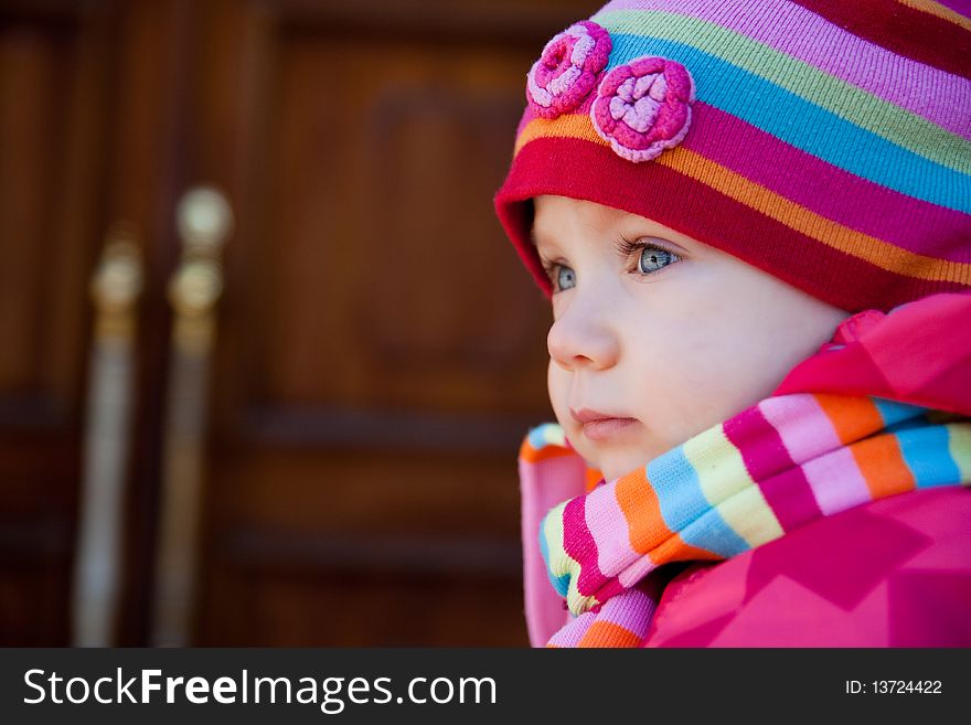 Portrait of beautiful child in stripe cap