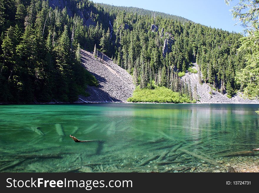 Summer hiking view in green drop lake. Summer hiking view in green drop lake.