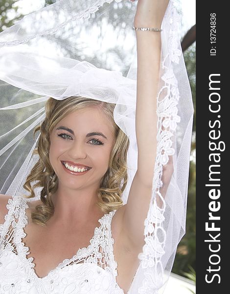 Blond bride with curly locks and beautiful features. Blond bride with curly locks and beautiful features