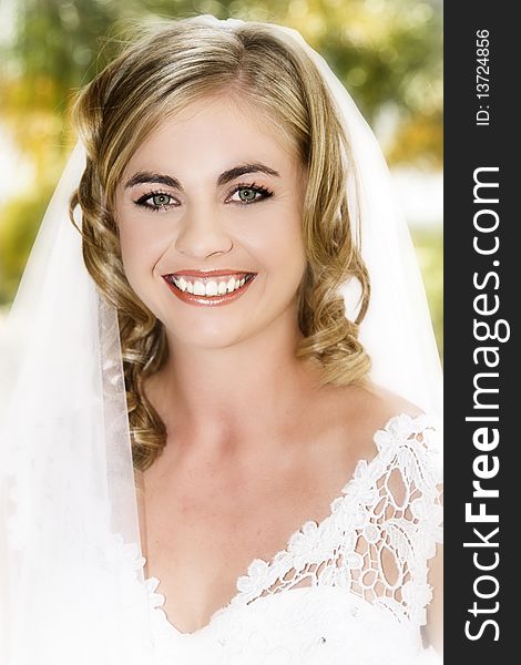 Blond bride with curly locks and beautiful features. Blond bride with curly locks and beautiful features