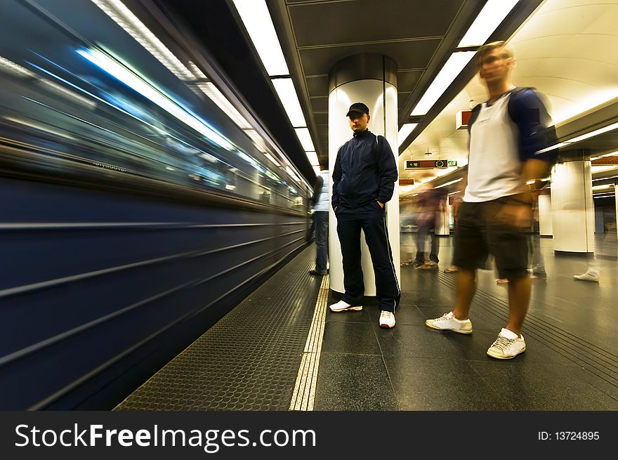 2 young man waiting for the subway. 2 young man waiting for the subway