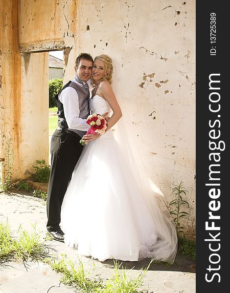 Beautiful Blond bride and her groom on their wedding day. Beautiful Blond bride and her groom on their wedding day