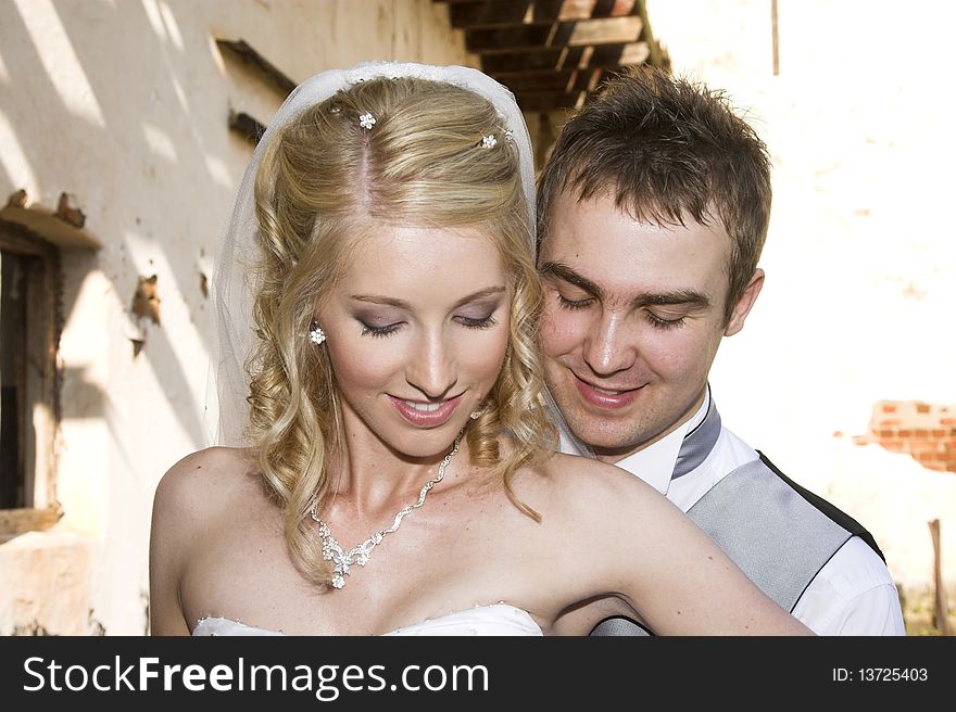 Beautiful Blond bride and her groom on their wedding day. Beautiful Blond bride and her groom on their wedding day