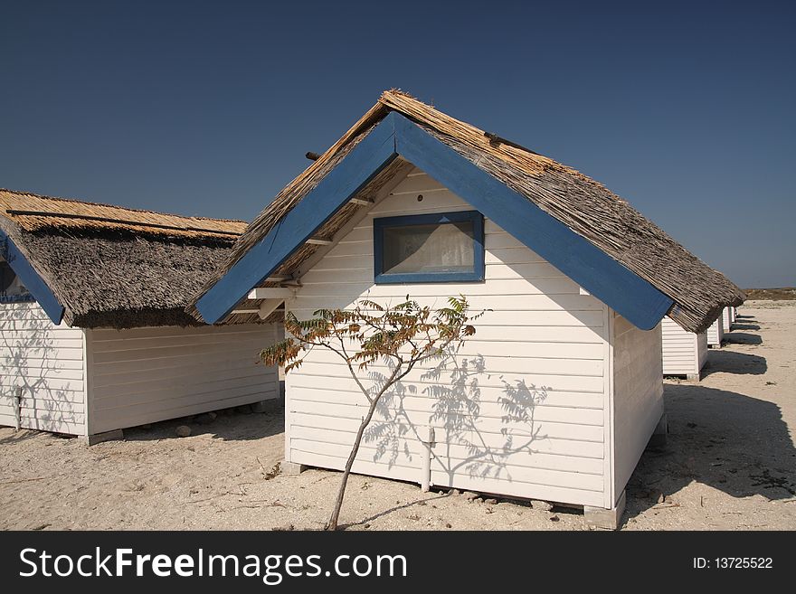 Houses with thatched roof on the seashore in Romania. Houses with thatched roof on the seashore in Romania