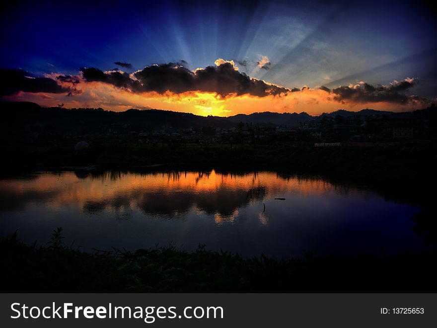 The sun setting at La Trinidad Valley, Benguet, Philippines. The sun setting at La Trinidad Valley, Benguet, Philippines.