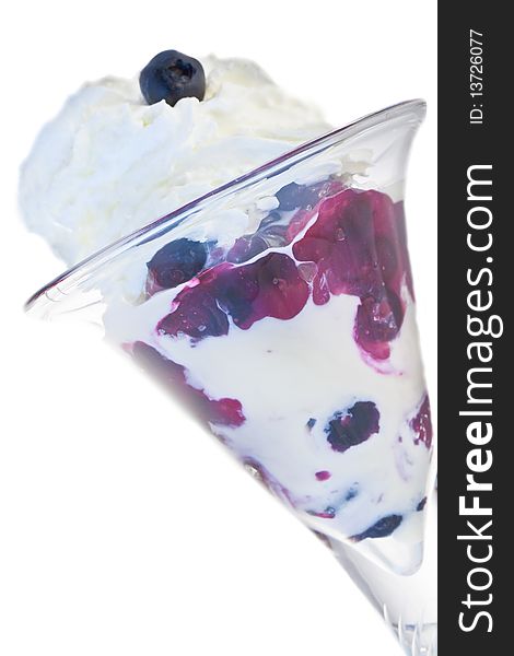 Elegant blueberry parfait served in a crystal glass.