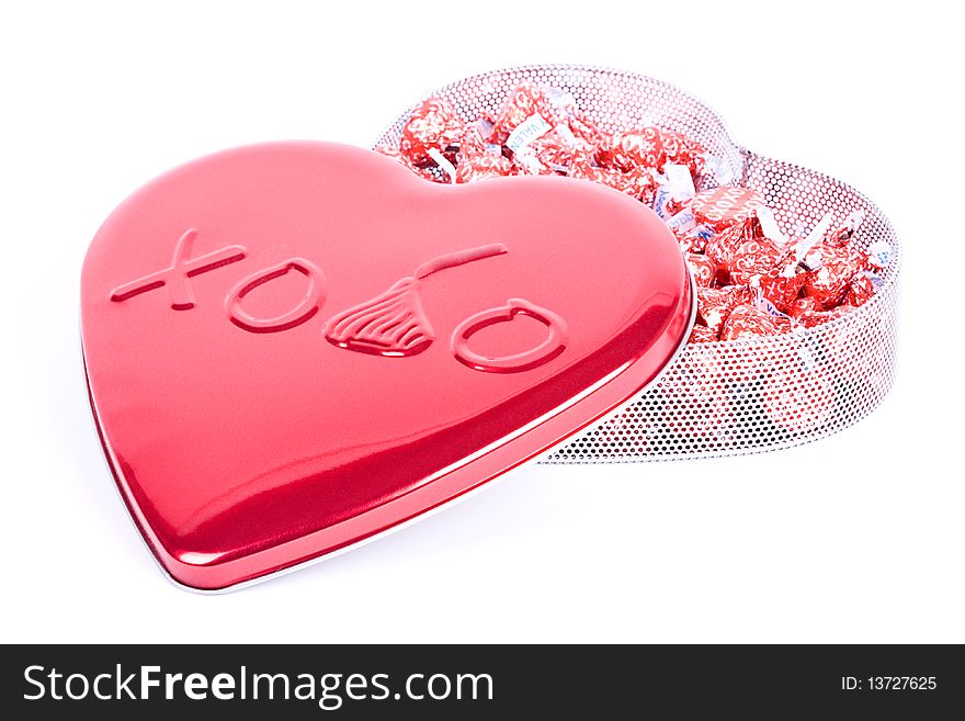 Valentine's Day setup with red heart shaped candy box. Valentine's Day setup with red heart shaped candy box.