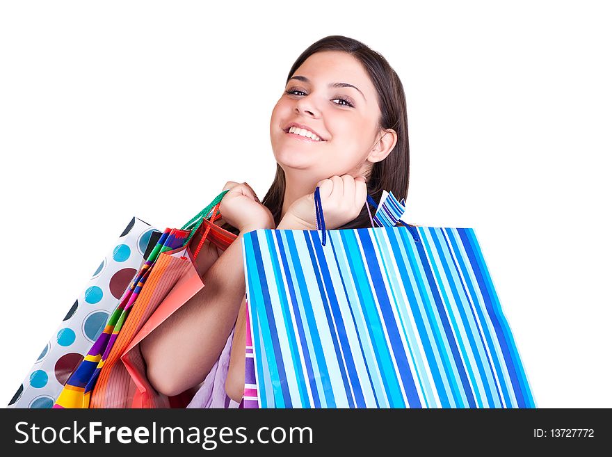 Happy young woman with shopping paper bags. Happy young woman with shopping paper bags