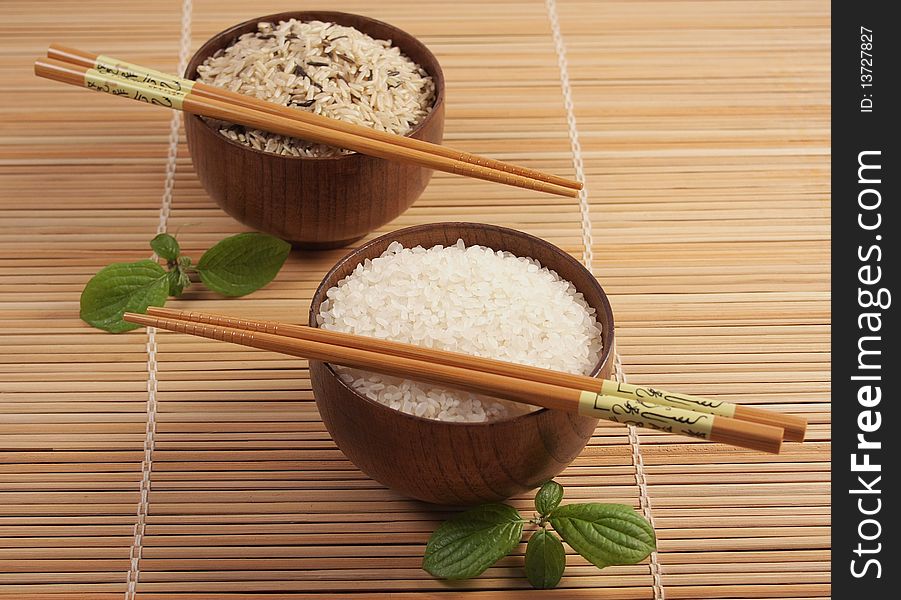 Two bowls with white and brown rice-2. Two bowls with white and brown rice-2