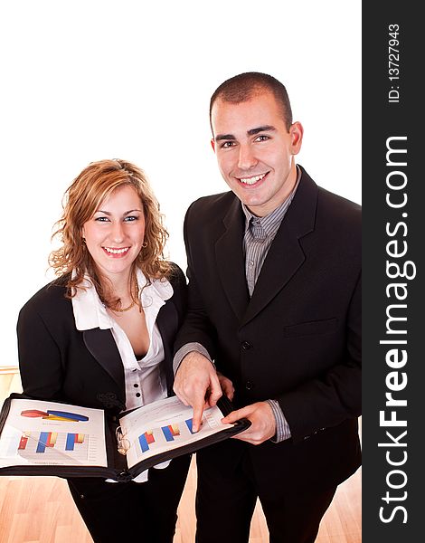 Young businessman and businesswoman smiling and holding documents. Young businessman and businesswoman smiling and holding documents