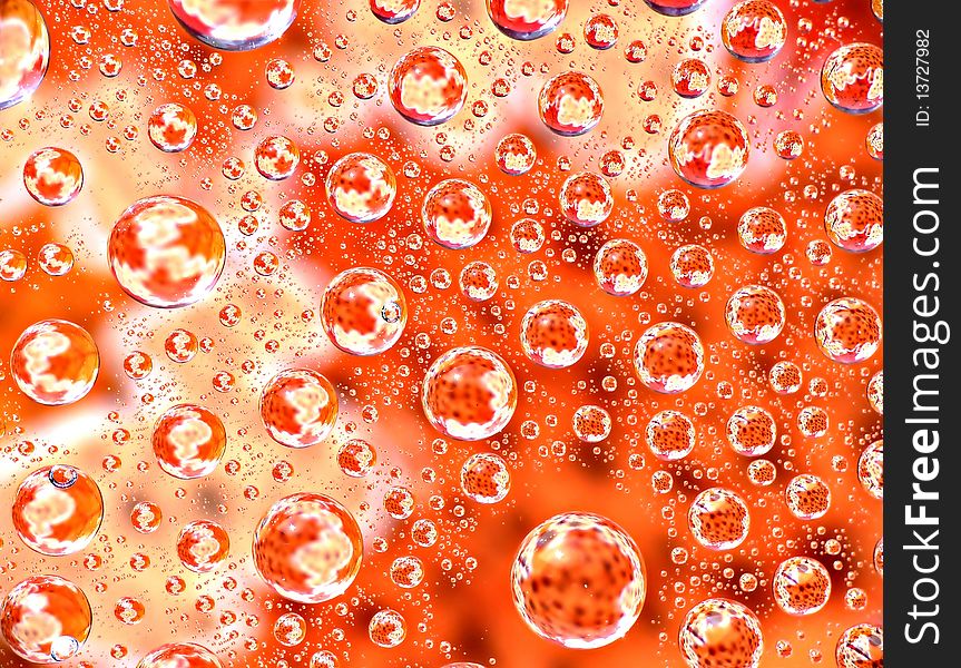 Autumn leaves in water drops as background