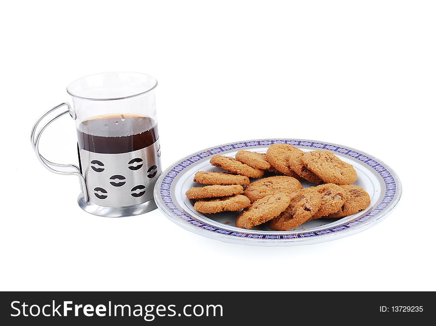 Coffee and brown cookies isolated on a white background. Coffee and brown cookies isolated on a white background.