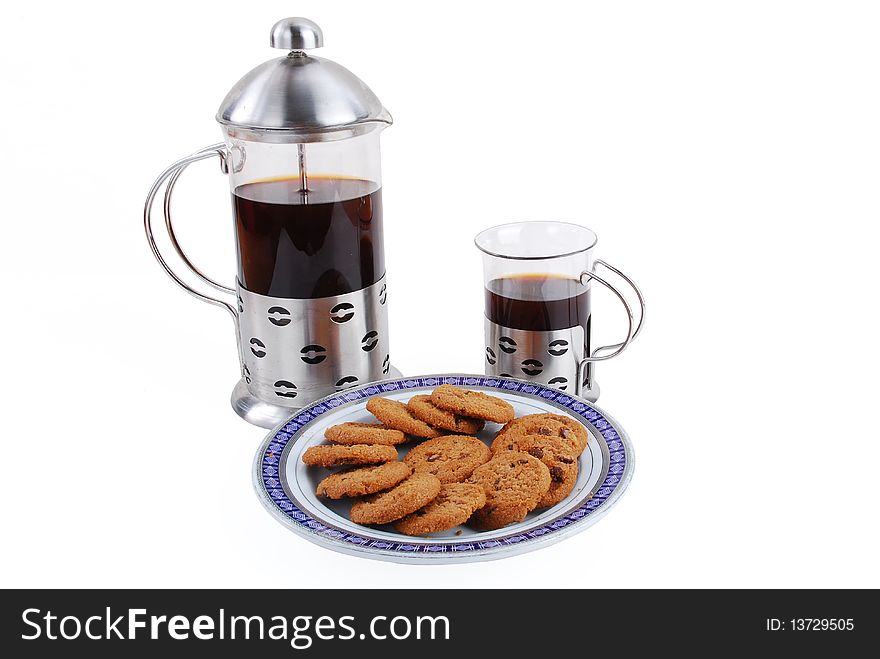 Coffee and brown cookies isolated on a white background. Coffee and brown cookies isolated on a white background.