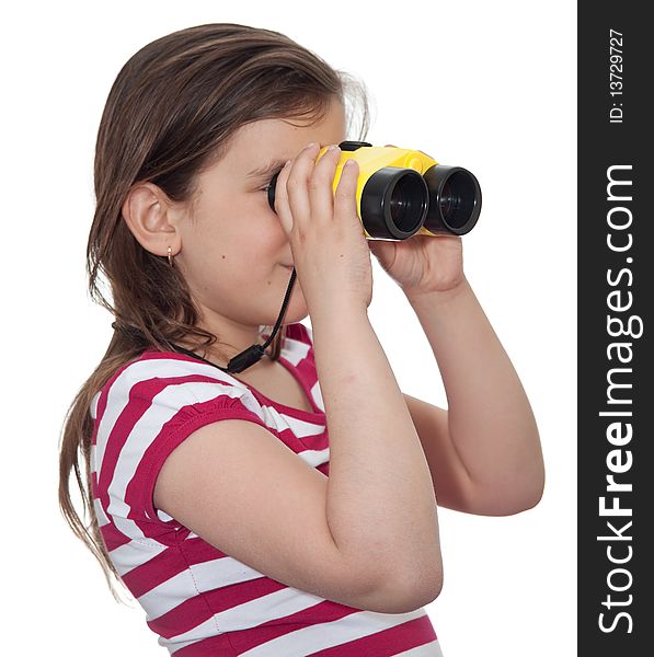 Girl looking through a pair of binoculars isolated on white